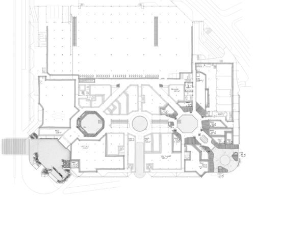 Upper floor architectural plan with circular and rectilinear spaces.